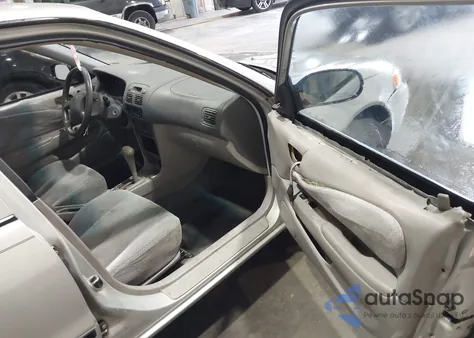 1999 Toyota Corolla Ce from USA, damaged, VIN 1NXBR12E7XZ251058